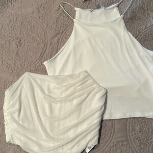 2 white midriff tank tops. Both size medium. New with tags.